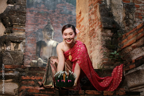 Photography Asia Loy krathong tradition that paid respects to the water spirits, Beautiful woman dressed in Thai national costumes
