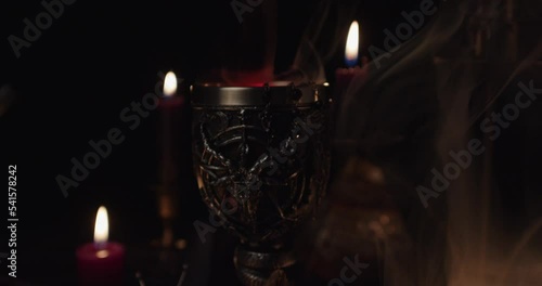 Altar for satanic rituals on a black background.