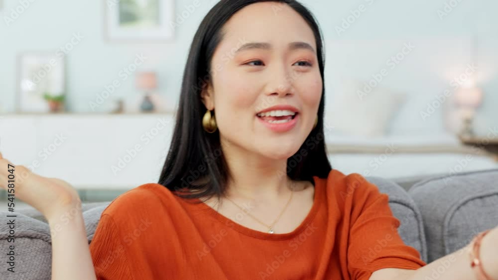Happy, phone call and woman on video call communication talking on smartphone sitting on sofa of apartment home in Singapore. Asian girl, relax on couch and talking on 5g wifi connection with a smile Happy, phone call and woman on video call communication talking on smartphone sitting on sofa of apartment home in Singapore. Asian girl, relax on couch and talking on 5g wifi connection with a smile