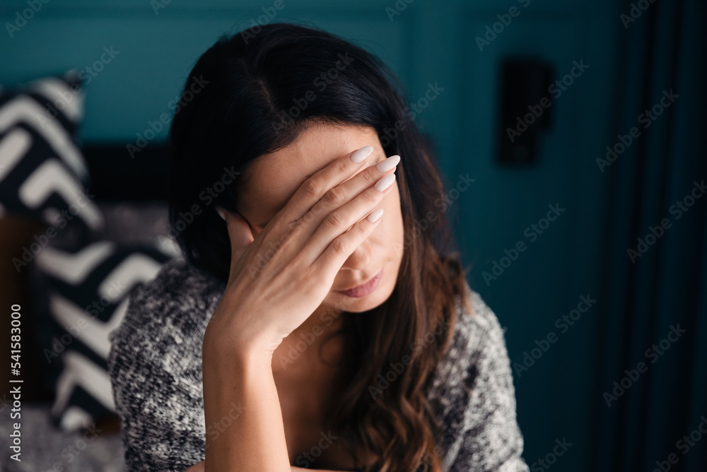 Depressed woman. Sadness and headache concept Depressed woman. Sadness and headache concept