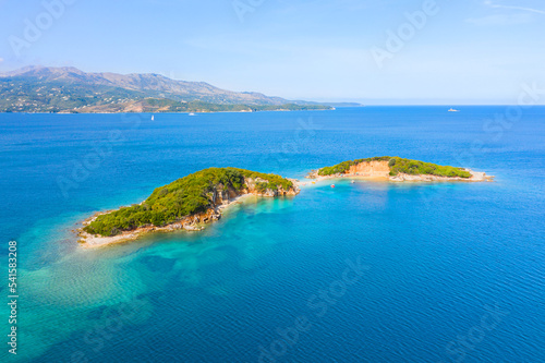 Fototapeta Naklejka Na Ścianę i Meble -  Ksamil beaches. Four islands. The bay. The Tetran Archipelago. Ksamil. Albania. Drone shooting. Aerial photography