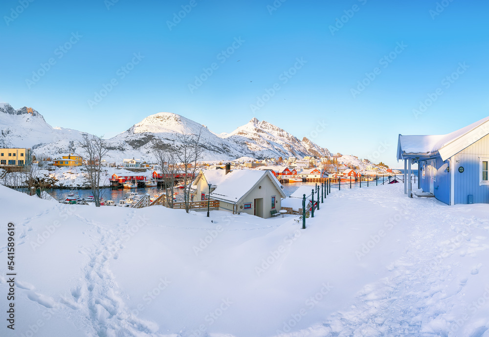 Astonishing snowy morning  cityscape of Sorvagen town.