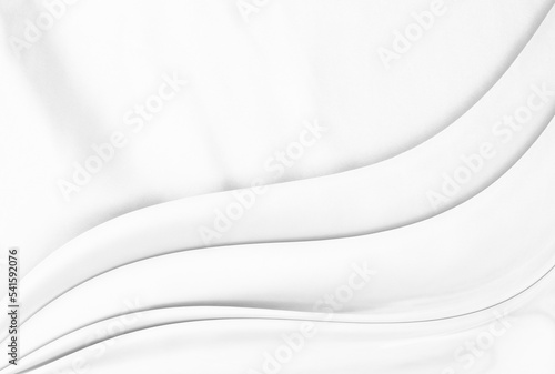 White gray satin texture that is white silver fabric silk background with beautiful soft blur pattern natural.