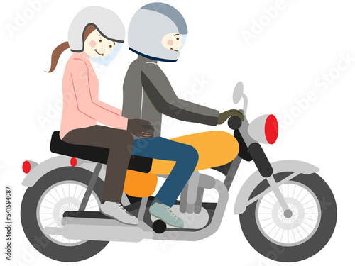 バイクに2人乗りの男性と女性（アメリカンバイク）