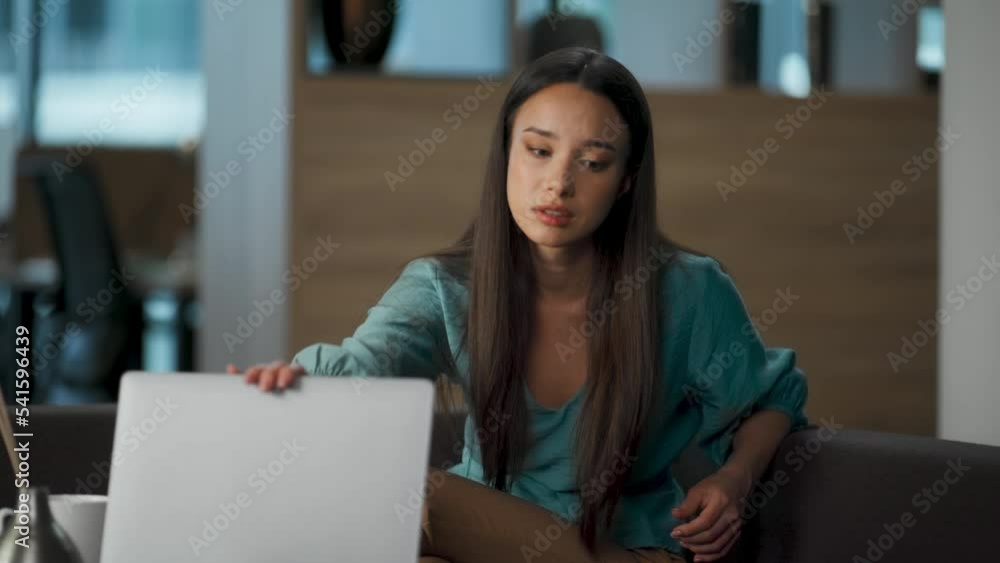 Upset person closed laptop at lounge zone closeup. Worried asian woman crying Upset person closed laptop at lounge zone closeup. Worried asian woman crying