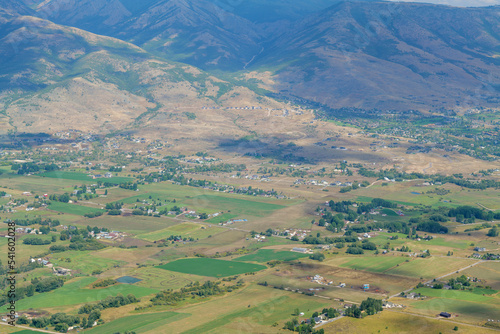 Summer mountain landscape in the USA. Sunny day and cloudy sky, Village view from the top of the rock. High-quality photo