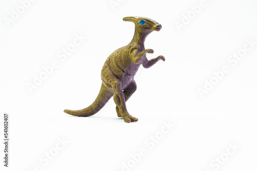 Plastic Parasaurolophus dinosaur toy on white background © Alessandro Vecchi