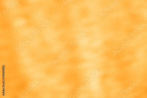 Abstract blurred orange texture background, blank orange wall background