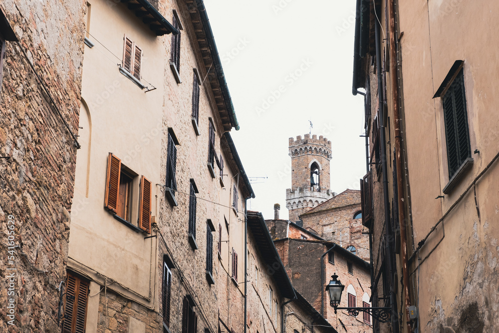 One of the 5 famous towers of San Gimignano seen from an alley