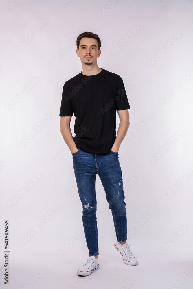 Portrait of happy handsome young man posing on isolated background Portrait of happy handsome young man posing on isolated background
