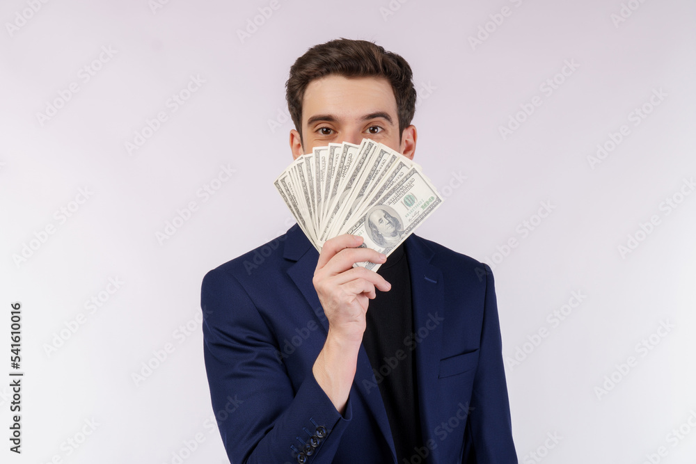 Portrait of a cheerful man holding dollar bills over white background Portrait of a cheerful man holding dollar bills over white background