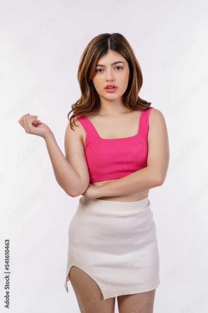 Portrait of young female model with perfect skin posing in fashion isolated over white background Portrait of young female model with perfect skin posing in fashion isolated over white background