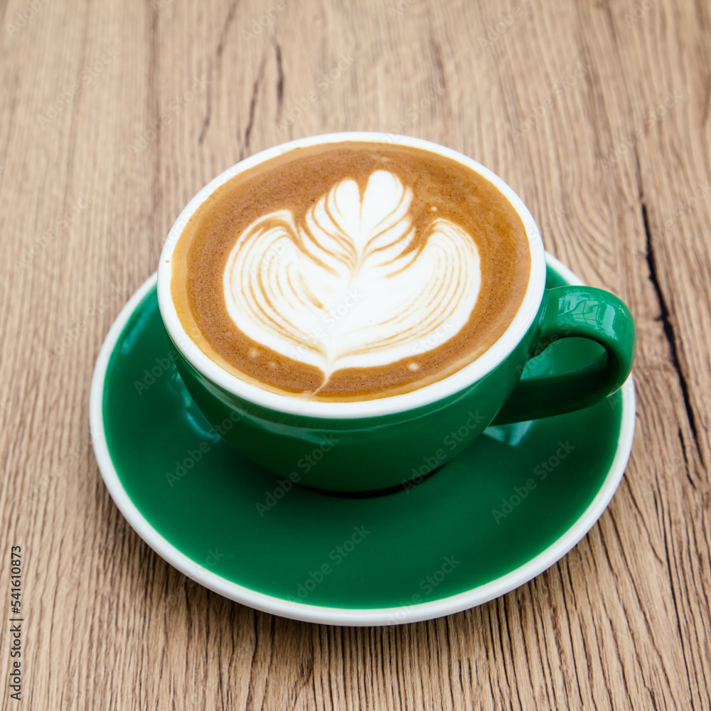 A cup of hot cappuccino A cup of hot cappuccino
