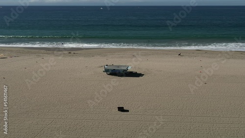Aerial shot of a lifeguard tower at Santa Monica State Beach in California