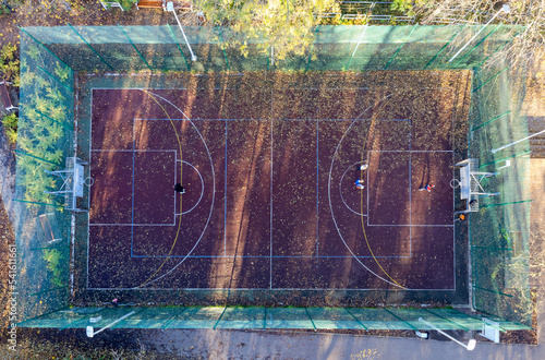 Obraz na płótnie Basketball and soccer field seen from above, sports facility. Drone photo, bird's eye view photo. w salonie