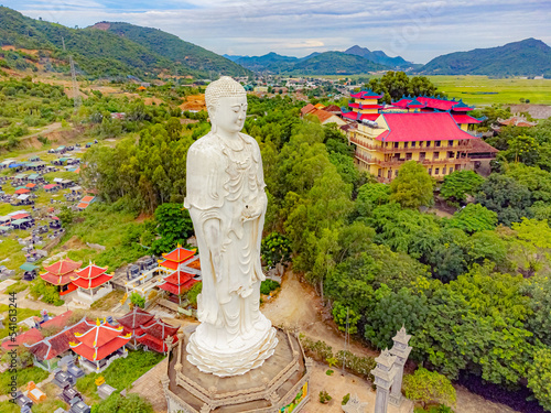 Buddhist temple. Chua Teong Lam Lotion Pagoda is a Buddhist temple with a large concrete statue of Buddha Amitabha 44 m high, which is the largest in Vietnam.  photo