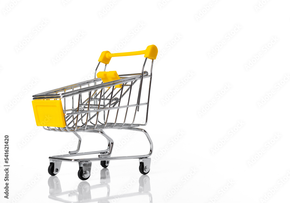 Empty yellow shopping cart and copy space with side view- isolated on white background Empty yellow shopping cart and copy space with side view- isolated on white background