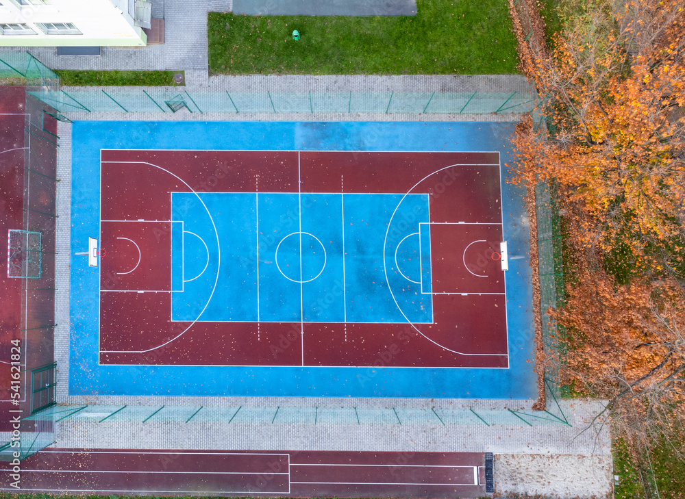 Basketball and soccer field seen from above, sports facility. Drone photo, bird's eye view photo.