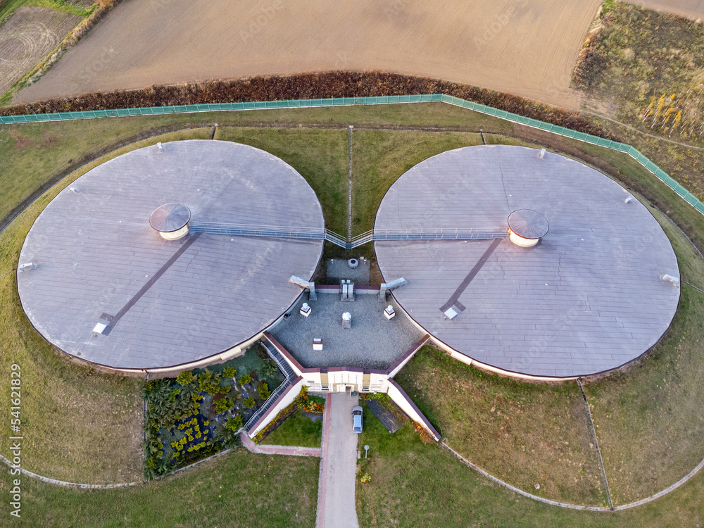 Top view, drone photo. Round roofs, two buildings. Waterworks , power plant, industrial building.