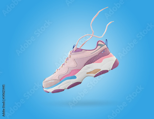 Flying colorful sneaker on blue background. Fashionable stylish sports shoes. Creative minimalistic footwear layout. Lifestyle product photo, levitation and urban style concept.