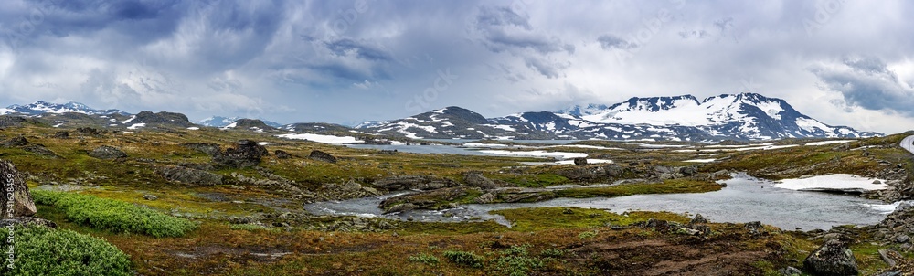 Panorama of the Sognefjellet in Norway with dark storm clouds Panorama of the Sognefjellet in Norway with dark storm clouds
