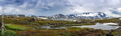 Panorama of the Sognefjellet in Norway with dark storm clouds photo