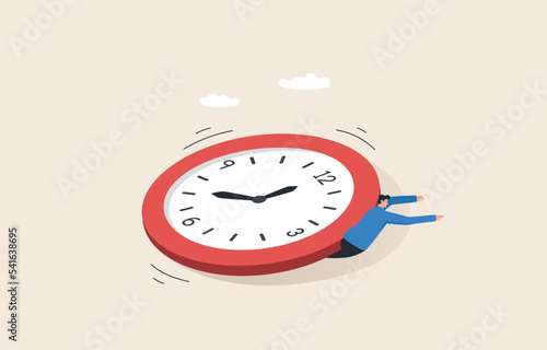 Stress and time pressure, deadline, overtime. businessman under a big clock.