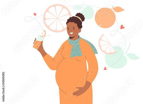Pregnant African-American woman holds healthy fruit juice in her hand . Nutrition and diet during pregnancy.
