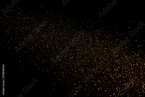yellow glitter on black background