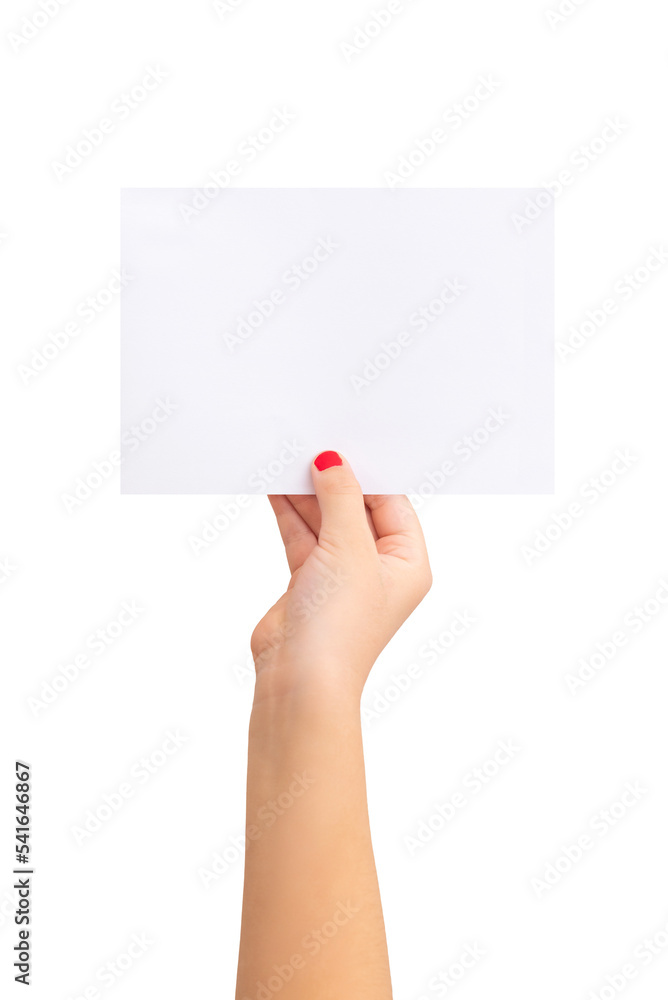 Fototapeta premium Girl's hand holding a small sheet of paper. Blank paper for text presentation.