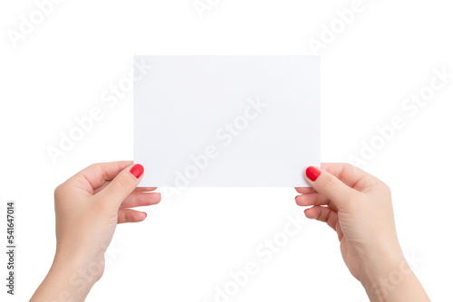White A6 paper in woman's hands. Horizontal position. Blank sheet for copy presentation. Isolated bacgkround photo