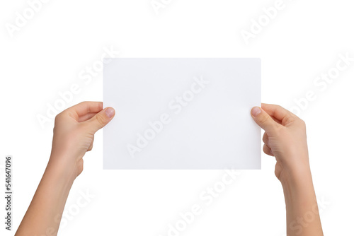 White sheet of paper in the hands of a boy. Horizontal position. Isolated background