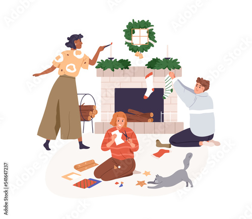 People decorating home for Christmas holiday. Happy family preparing decorati...