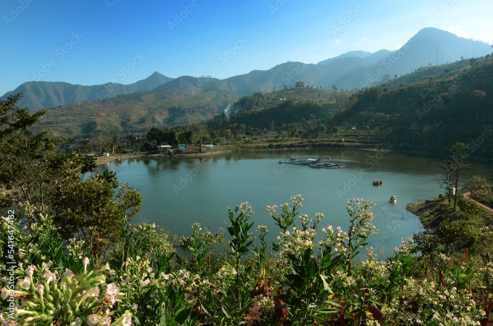 View of the blue lake with green natural scenery View of the blue lake with green natural scenery
