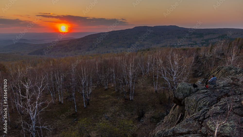 Beautiful sunset over the valley in the Ural mountains.