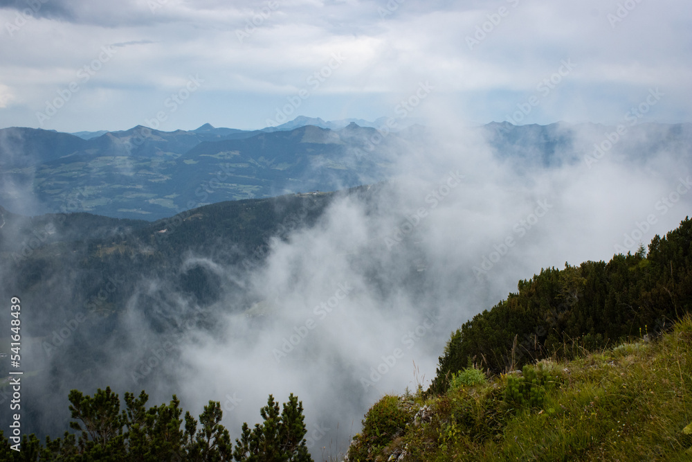Viewing point at The Eagle's Nest in Germany. View of the German mountains with fog.