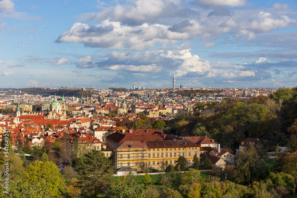 Fototapeta premium Autumn Prague City with with its Buildings, Towers, Cathedrals and Bridges in the sunny Day, Czech Republic
