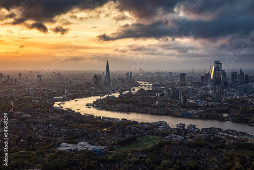 Photography High panoramic view of the urban London skyline during a autumn sunset with clou