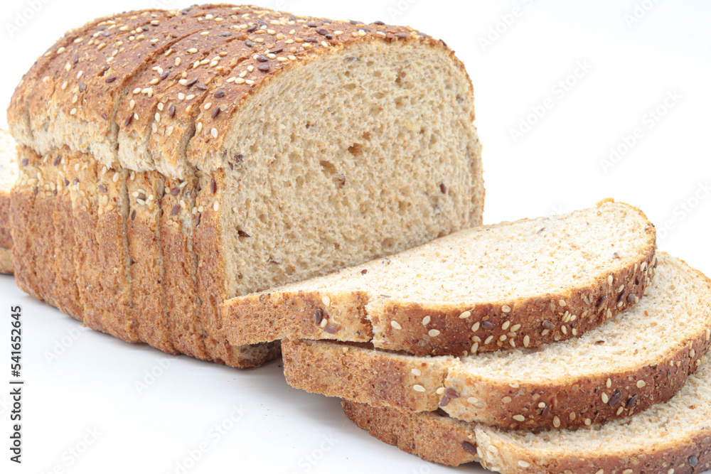 sliced wholemeal bread, on white background. Concept of healthy food, balanced breakfasts, fiber foods. sliced wholemeal bread, on white background. Concept of healthy food, balanced breakfasts, fiber foods.
