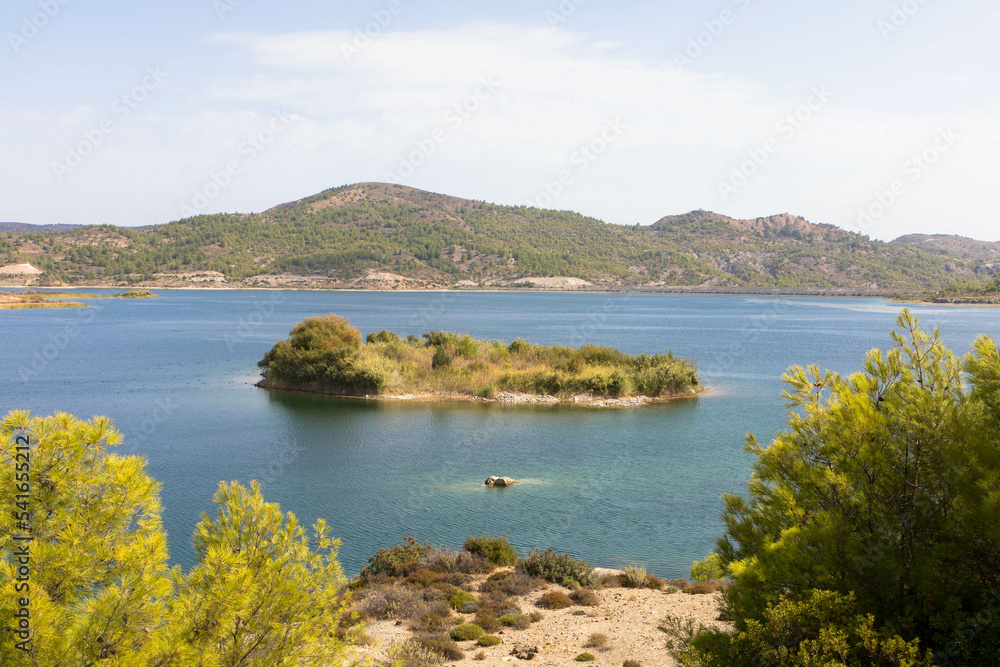 Panoramic view of Gadouras Dam. Solving the important and crucial water supply problems. Near the villages of Lardos and Laerma in the southern part of the island. Rhodes, Greece.