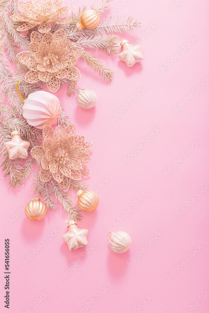 golden christmas decorations on pink background golden christmas decorations on pink background