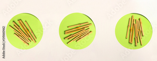 Eco bamboo in green circles on neutral background. Concept, natural material organic cutlery, zero waste, eco-friendly, banner (ID: 541660462)