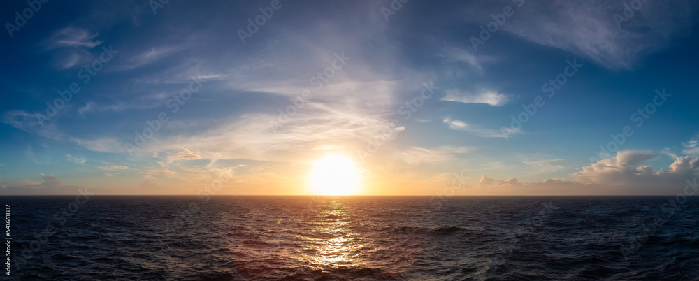 Dramatic Colorful Sunset Sky over North Atlantic Ocean. Cloudscape Nature Background. Panorama
