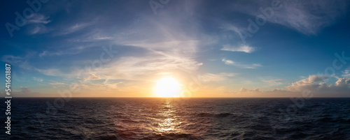 Dramatic Colorful Sunset Sky over North Atlantic Ocean. Cloudscape Nature Background. Panorama