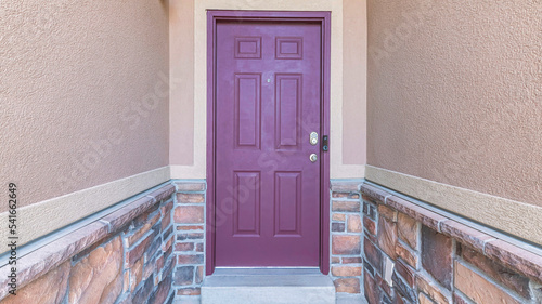 Panorama Purple front door with arched transom window and digital key access photo