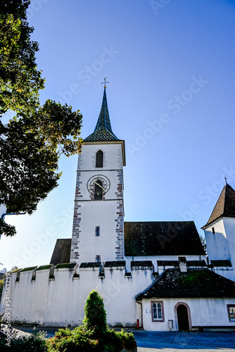 Muttenz, Kirche, St. Arbogast-Kirche, Sankt Arbogast, Reformierte Kirche, Ringmauern, Kirchhof, Dorf, Dorfkern, Kirchplatz, Kirchturm, Baselland, Herbst, Schweiz photo