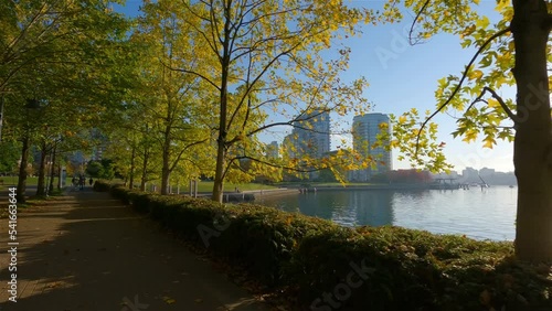 Wallpaper Mural Seawall in False Creek in a modern Downtown City. Sunny Fall Season Sunrise. Vancouver, British Columbia, Canada. Torontodigital.ca
