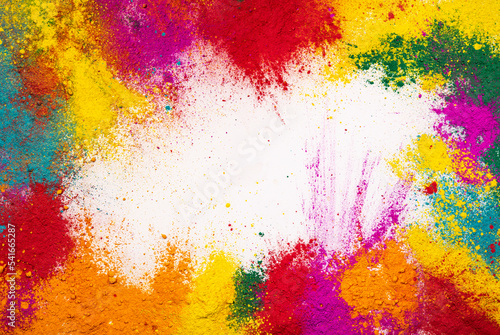 Colorful holi powder explosion isolated on white wallpaper background