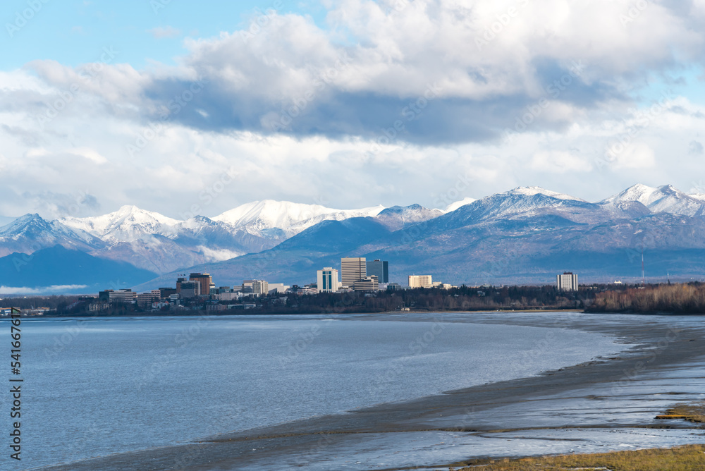 Aerial view downtown Anchorage Alaska with Cook Inlet, Turnagain Arm  and snow cap Chugach Mountain in background