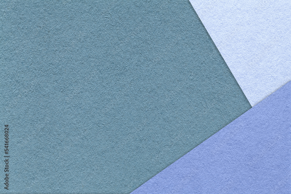 Texture of craft cool gray color paper background with blue and very peri border. Vintage abstract cardboard. Texture of craft cool gray color paper background with blue and very peri border. Vintage abstract cardboard.